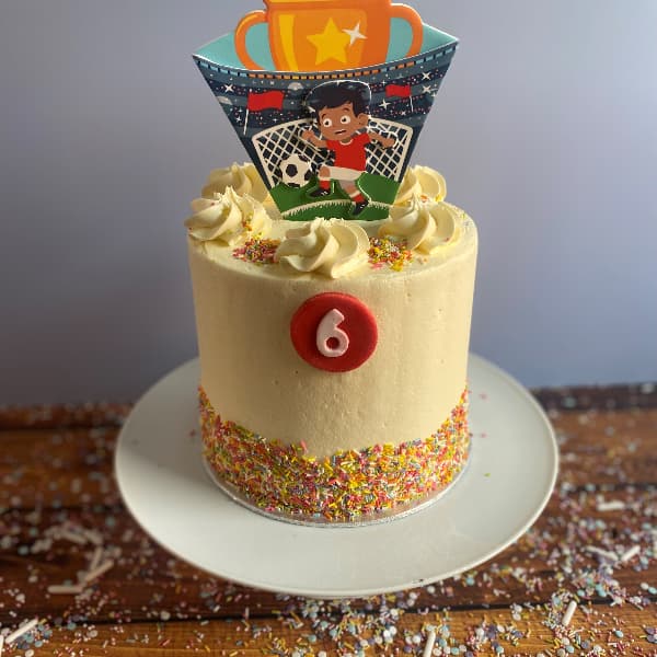 Tall tier soccer cake 2023 Tall Tier Buttercream Soccer Cake with soccer Topper and Sprinkles