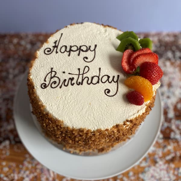 Fresh Cream and Fruit with Hazelnut Crunch Fresh cream and Fruit Birthday Cake with Hazelnut crunch